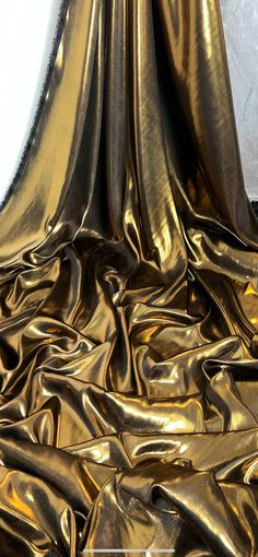 "1 mtr black/gold shimmer on satin fabric This is quality fabric and is silky satin fabric It is 58\" wide (147cm) This is ideal for dress making lining,bridal dress lining, waiste coat,decorations,table runners, and many other projects If more than one quantity is bought it will be sent in one continous length All items are dispatched within one working day (Please note i try my best to get exact color of the fabric there might be a slight different in color due to different montior screens and camera lighting) Any questions feel free to ask and please take time to look at my shop" Black Satin Aesthetic, Satin Aesthetic, Expensive Fabrics, Gold Clothes, Gold Drapes, Dress Lining, Sophisticated Aesthetic, Decorations Table, Bridal Fabric