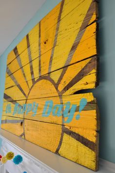 a wooden sign with the words do you know? on it in blue and yellow