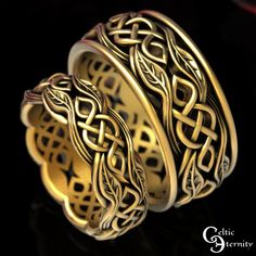 two gold rings with intricate designs on each side and an intertwined design in the middle