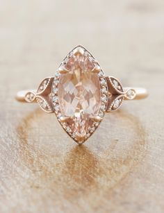 caption:Shown in 14k rose gold Pink Marquise Ring, Pink Diamond Ring Engagement, Pink Marquise Gemstone Rings, Pink Marquise Ring With Center Stone, Marquise Cut Rose Diamond Wedding Ring, Pink Marquise Rose Cut Diamond Rings, Unique Gemstone Engagement Rings, Engagement Rings Romantic, Pink Diamond Engagement Ring