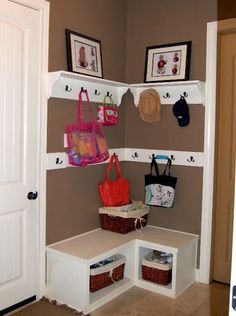 the entryway is clean and ready to be used as a storage area for purses