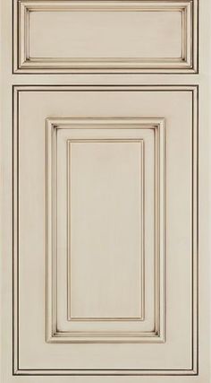 a white cabinet door with two drawers and one drawer on the bottom, in an antique style