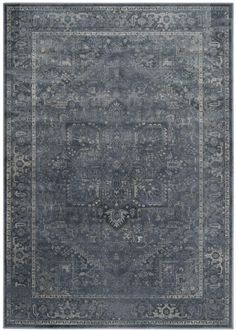 an area rug with blue and grey colors