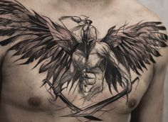 a man's chest is covered with black ink and has an angel tattoo on it