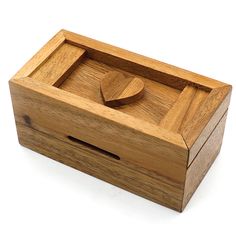 a wooden box with a heart in it