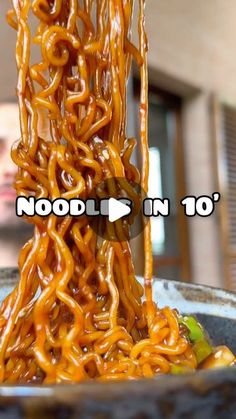 noodles being lifted from a bowl with the words noodle in 10'above it