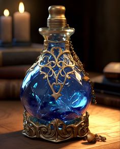 a blue glass bottle sitting on top of a wooden table next to two lit candles