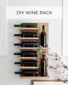 a wooden wine rack with bottles on it