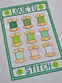 a cross stitch pattern with the words love to stitch written in green and white letters