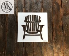 a paper cut out of a chair sitting on top of a wooden floor