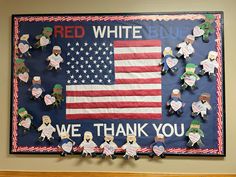 a bulletin board with red, white and blue decorations on it that says we thank you