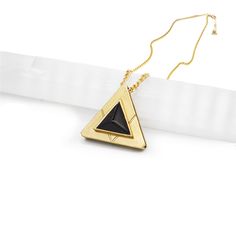 Luxury Crystal Jewelry. The Onyx Stellar Necklace in 18K gold plate is the most iconic and interesting piece you will wear on a daily. The somewhat delicate curb chain paired with our signature Triangle pendant is classic and trending. Turn heads and invoke thought with our handmade jewelry. DIPHDA is a women owned business owned by Ash Etchings. Handcrafted in Los Angeles, U.S.A. Available in silver color and gold colors. #stone_onyx Water Moon, Sun Energy, Cosmic Jewelry, Moon Energy, Slider Necklace, Two Necklaces, Triangle Necklace, Triangle Pendant, The Triangle