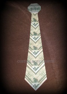 a tie with twenty dollar bills on it