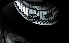 an image of a spiral staircase in black and white