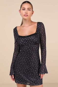 You'll be the biggest catch of the season in the Lulus Especially Adored Black Polka Dot Long Sleeve Mini Dress! A classic white polka dot print adorns stretchy mesh as it shapes a square neckline with lacy trim and a rosette detail, all framed by long sleeves with elastic at the shoulders and flared cuffs. Fitted bodice boasts an empire waist that continues into a figure-skimming A-line skirt with a mini hem. A top loop-button closure secures atop a keyhole cutout at the back. Hidden back zipper/clasp. Fit: This garment fits true to size. Length: Mid-thigh. Size medium measures 32.25" from shoulder to hem. Bust: Great for any cup size. Waist: Fitted - stretchy fabric allows custom fit. Hip: Not Fitted - fuller skirt allows room for hips. Undergarments: May be worn with a strapless bra, ad Dress With Lace Trim, Mini Dress Long Sleeve, Mesh Mini Dress, Long Sleeve Mini, Strapless Bra, Polka Dot Print, Black Polka Dot, Dot Print, Long Sleeve Mini Dress