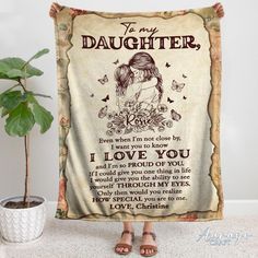 a woman's personalized blanket with the words to her daughter