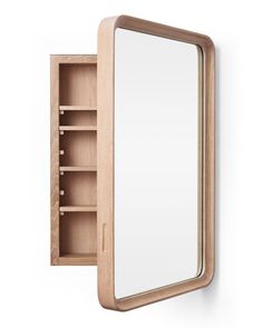 a wooden medicine cabinet with a mirror on the front and shelves below it, against a white background