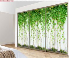 an image of a bedroom with green plants on the wall