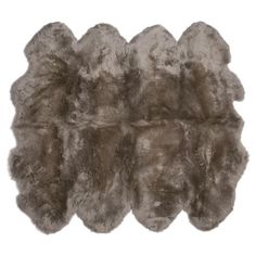 an animal fur rug is shown on a white background