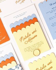 the wedding stationery is laid out on top of each other, with different colors