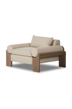 a small chaise lounge chair with wooden legs