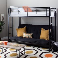 a black futon bunk bed sitting in a living room next to a white rug