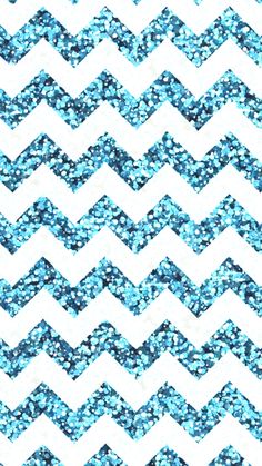 blue and white chevroned glitter fabric with an interesting pattern on the back ground