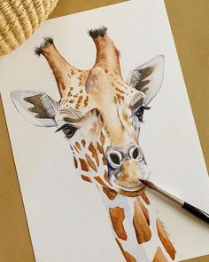 a painting of a giraffe is shown with a brush in it's mouth