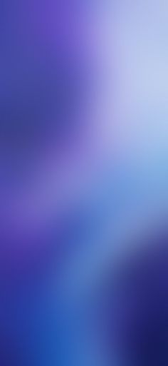 a blurry image of blue and purple colors