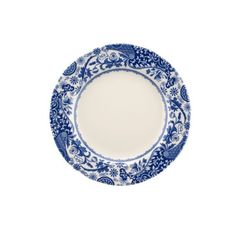 a blue and white plate on a white background