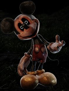 an animated mickey mouse standing on top of two onions in the dark with its eyes closed