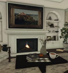 a living room filled with furniture and a fire place next to a painting on the wall