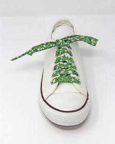 These beautiful floral 100% cotton shoelaces will cheer up the dullest of days and are perfect for any outfit!. Just pop them in like any pair of laces and enjoy them. So Retro and so on-trend! These laces are approx. 110 cm long and will fit any standard pair of plimsolls / sneakers up to 5 pairs of eyelets. The laces are sealed at the ends in the same way as commercial laces, but oh so much more fancy!  These can be made longer or shorter on request (please leave a message on checkout specifying the size required). These make fantastic unusual wedding favours and can be made in bulk to your specification - please ask for details.  Your guests will be talking about them for years to come ... To view the full range of Janeyjonks Floral Shoelaces follow this link - https://etsy.me/3dHVK5D T Unusual Wedding Favours, Etsy Shop Names, Unusual Weddings, Retro Vintage Style, Green Item, Cheer Up, Work Shoes, Yellow Floral, Canvas Shoes