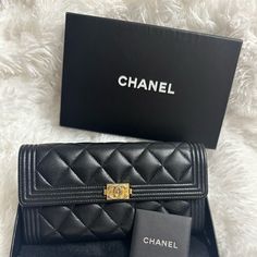 Preloved Chanel Boy Long Wallet Luxury Compact Clutch For Everyday Use, Designer Evening Clutch With Interior Card Slots, Luxury Compact Bag With Card Slots, Designer Everyday Luxury Rectangular Clutch, Designer Rectangular Clutch For Everyday Luxury, Designer Black Bags With Card Slots, Luxury Compact Wallets As Gifts, Luxury Compact Wallet As Gift, Luxury Wallet On Chain With Card Slots