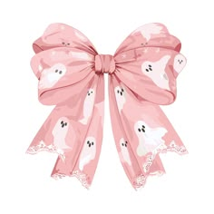 a pink bow with ghost faces on it