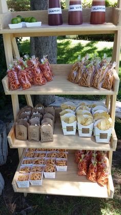 an outdoor food stand with various foods on it