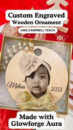 a christmas ornament with an image of a child on it and the words custom engraved