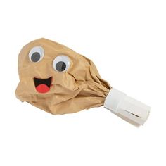 a brown paper bag with a face on it's side and a white handle