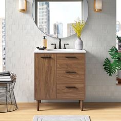 a bathroom with a sink, mirror and rug