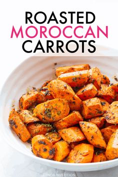 roasted moroccan carrots in a white bowl with the title above it reads roasted moroccan carrots