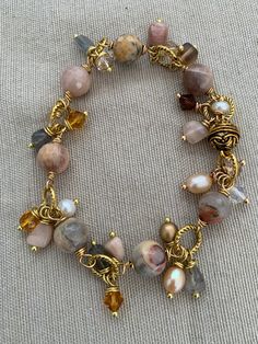 "Beautiful Labradorite + Faceted and smooth Peach Moonstone + Czech Glass +  Jasper + Swarovski crystals.   All set in Goldtone metals with a Ornate magnetic clasp.   Please list your bracelet size if you need 1/2\" increments. Handmade by Czechthatbead!" Dangle Bracelet, Stylish Bracelet, Peach Moonstone, Unique Bracelets, Girly Jewelry, Bead Jewellery