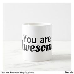 a white coffee mug with the words you are awesome on it