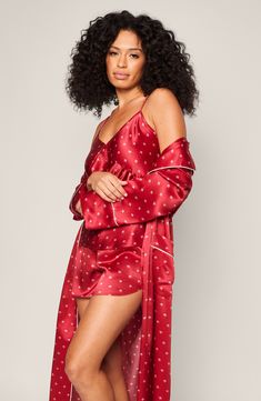 Exude elegance through your morning and nighttime routines in this luxurious mulberry-silk robe featuring a fierce print framed in classic piping. Notched collar Long sleeves Removable tie belt Front patch pockets 100% silk Machine wash, dry flat Imported Women Silk Robe, Bridal Slippers, Intricate Art, Luxury Sleepwear, Art Deco Fan, Truman Capote, Christmas Traditions Family, Loungewear Dresses, Pink Holiday