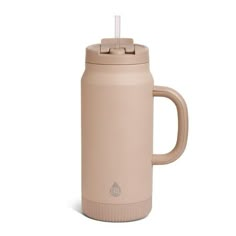 thermos travel mug with handle and lid is shown in light pink, on a white