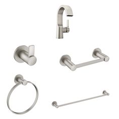 an assortment of bathroom accessories including toilet paper, towel ring and hand shower faucet