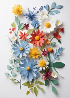 paper flowers arranged on top of each other with leaves and stems in different colors, shapes and sizes