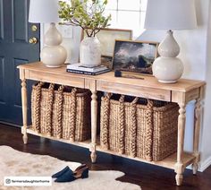 a wooden table with baskets on top of it