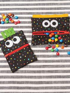 two small bags with candy eyes on them