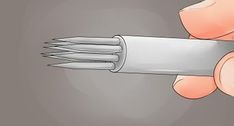 a person holding a knife in their right hand and pointing it at the other side