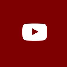 a red background with a white play button in the center and an arrow on the bottom right corner